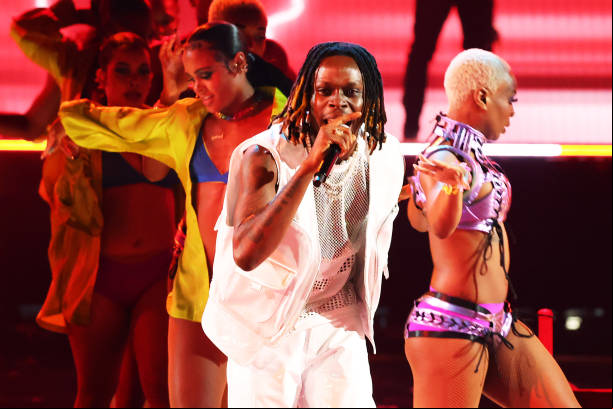 Fireboy Picture Performing on Stage